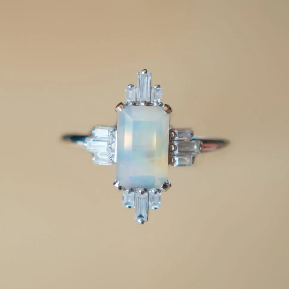 Emerald-Cut Opal Engagement Ring with Aztec-Inspired Baguette Stones in White 14K Gold - Image 1