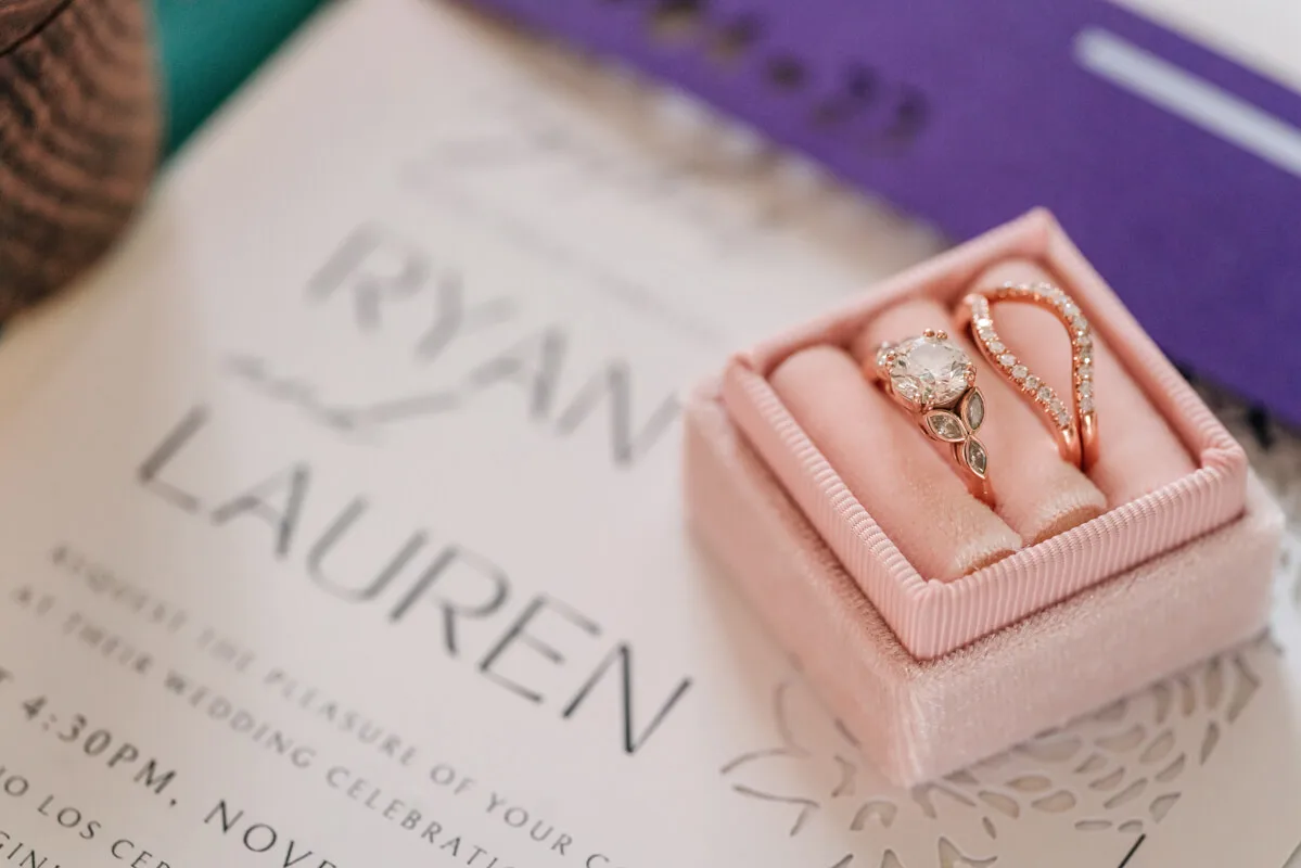 Nature-inspired lab diamond engagement ring with salt and pepper marquise leaf stones