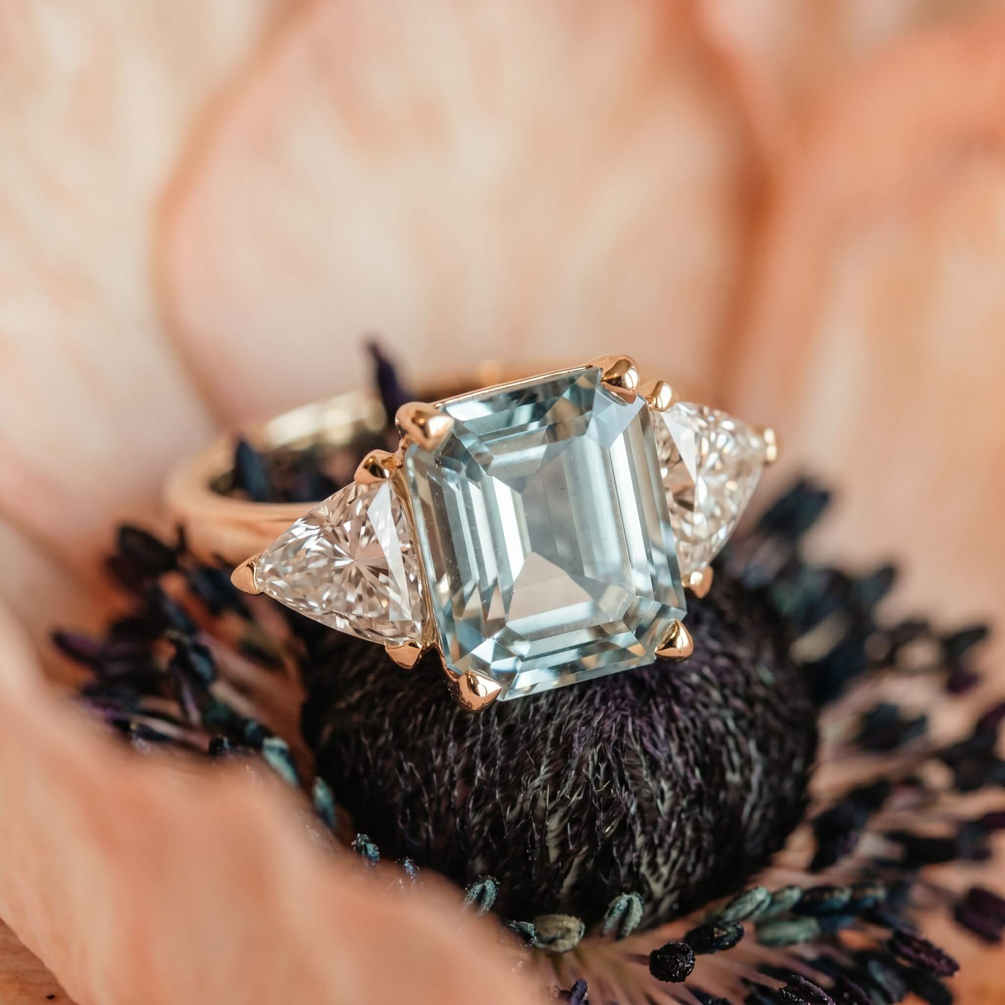 Aquamarine engagement ring with trillion cut diamonds