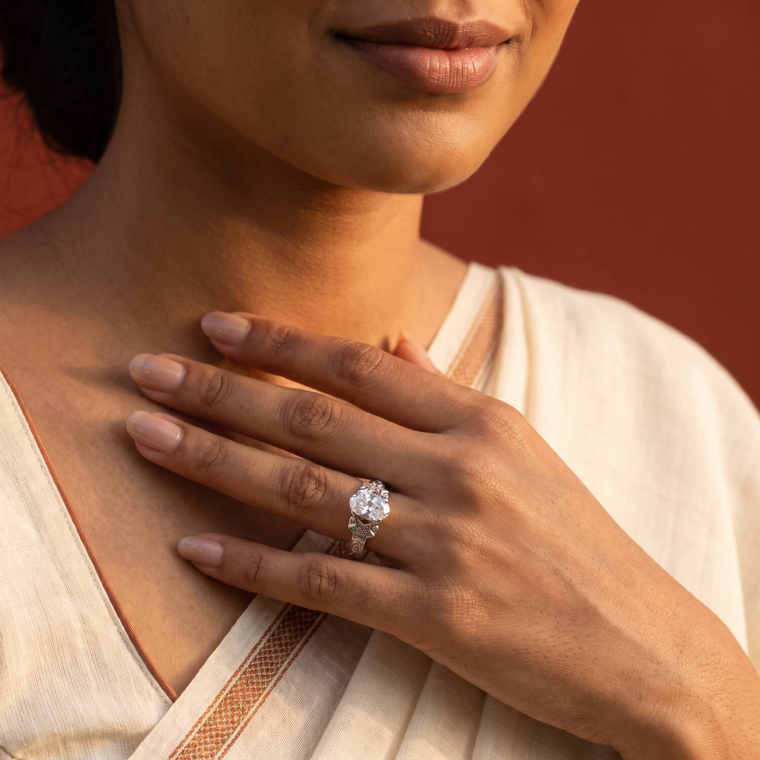 Coimbatore-inspired oval diamond heritage engagement ring worn on hand