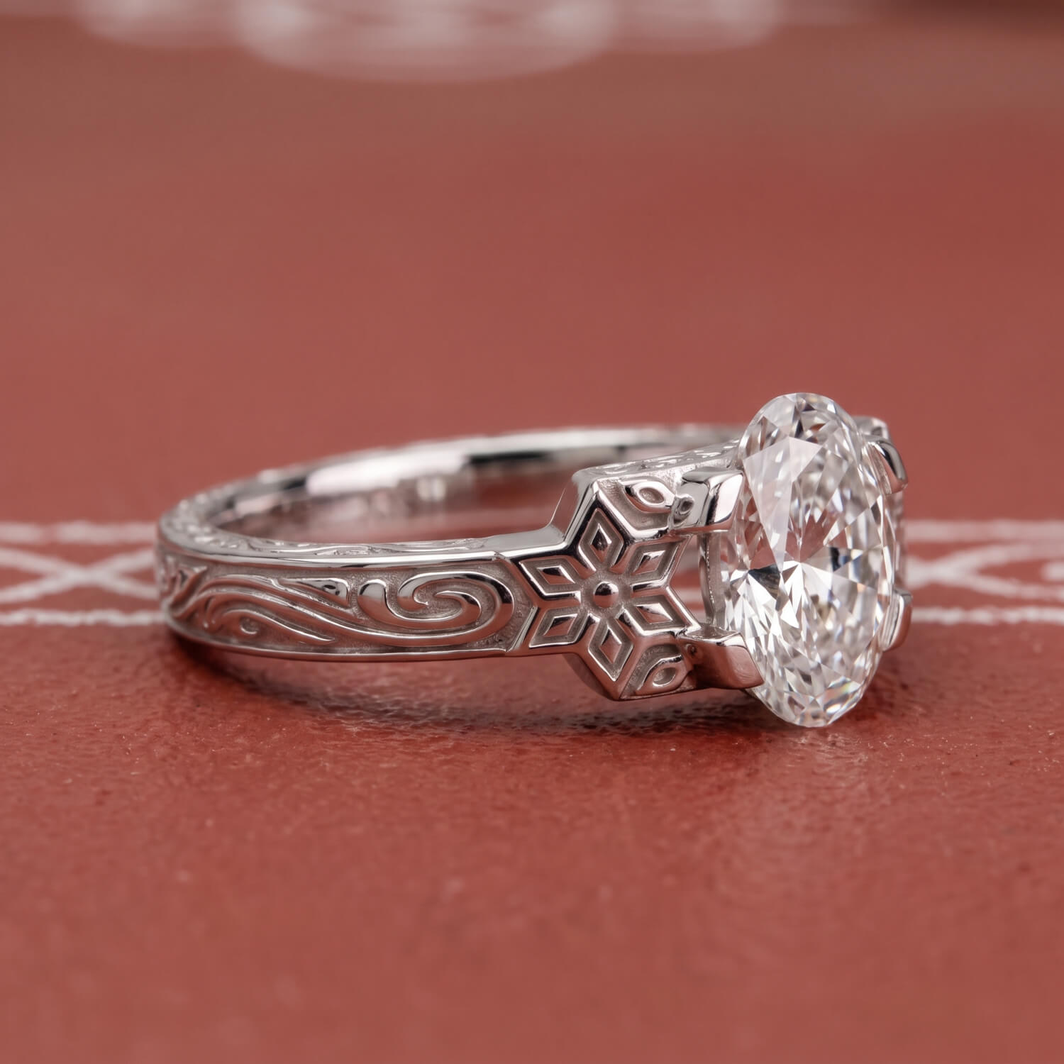 Sculpted white-gold engagement ring inspired by Tamil Nadu heritage