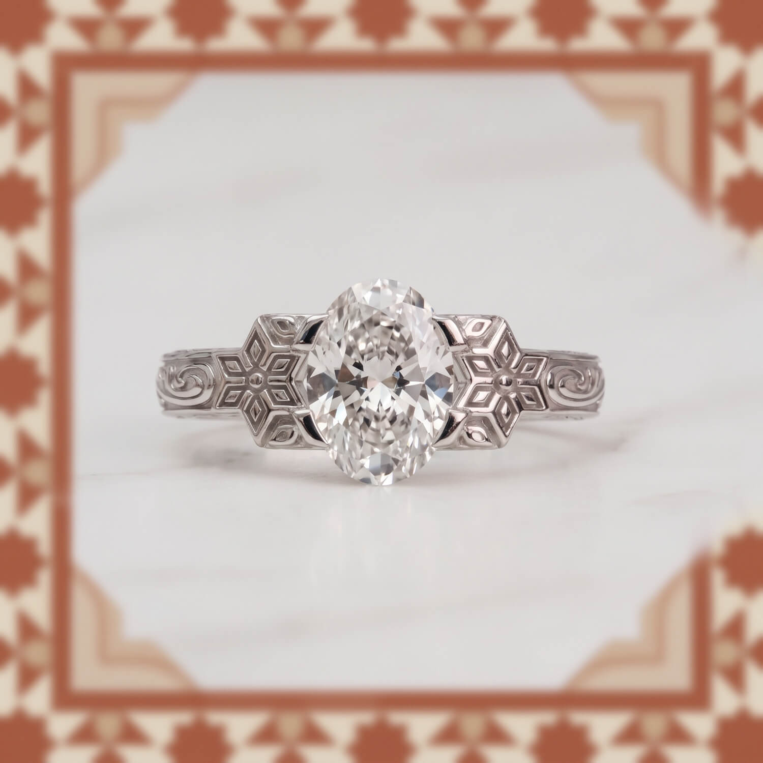 Oval lab-grown diamond in a smooth white-gold bezel setting
