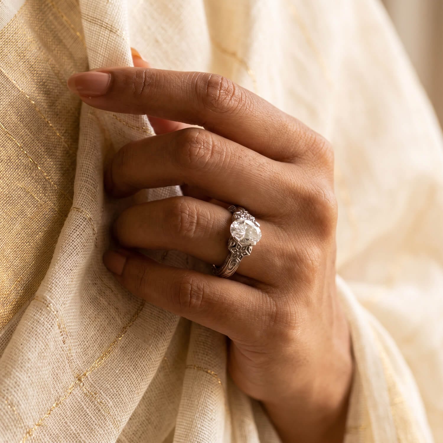 Sculpted Tamil Nadu heritage ring worn on hand