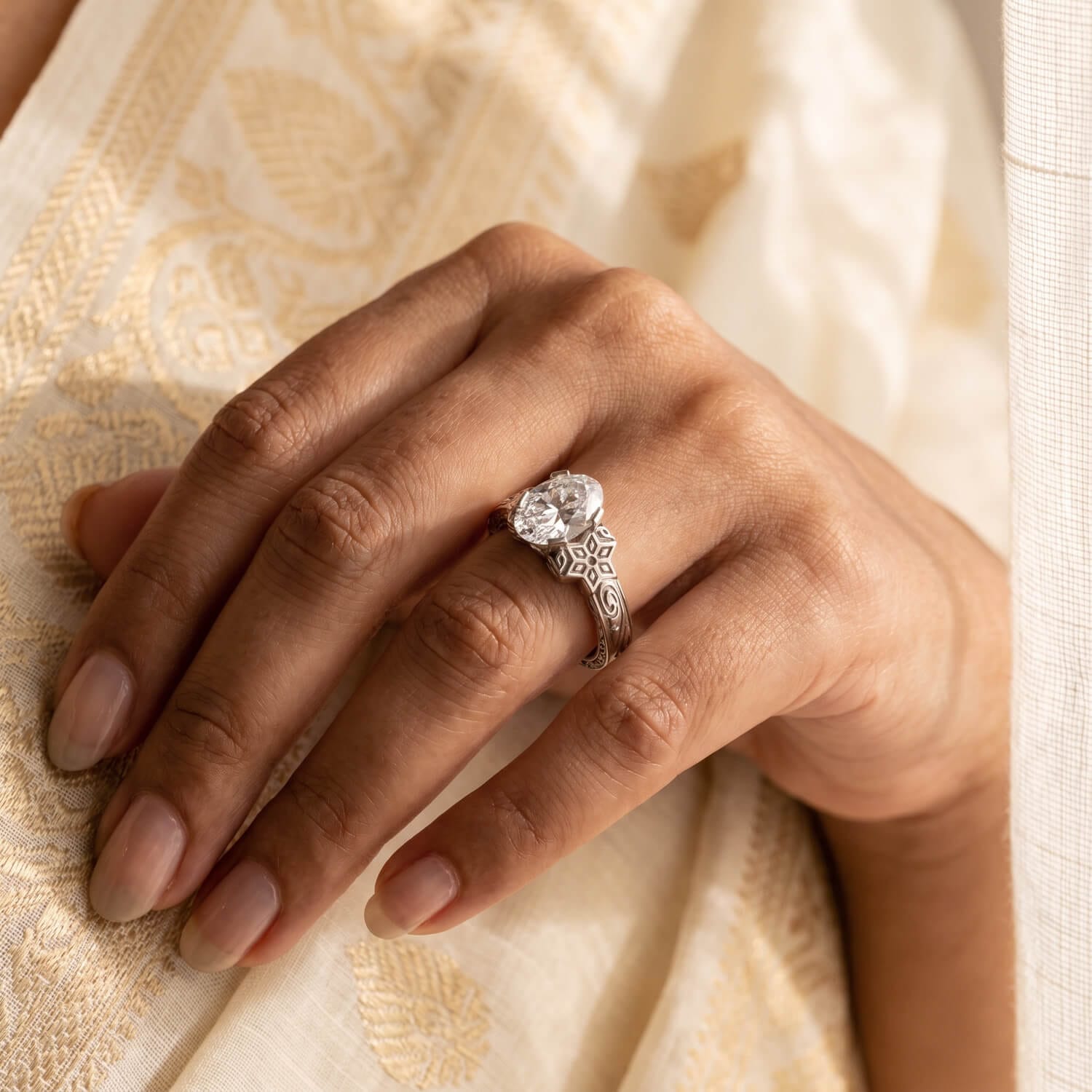 Coimbatore heritage oval diamond ring worn on hand