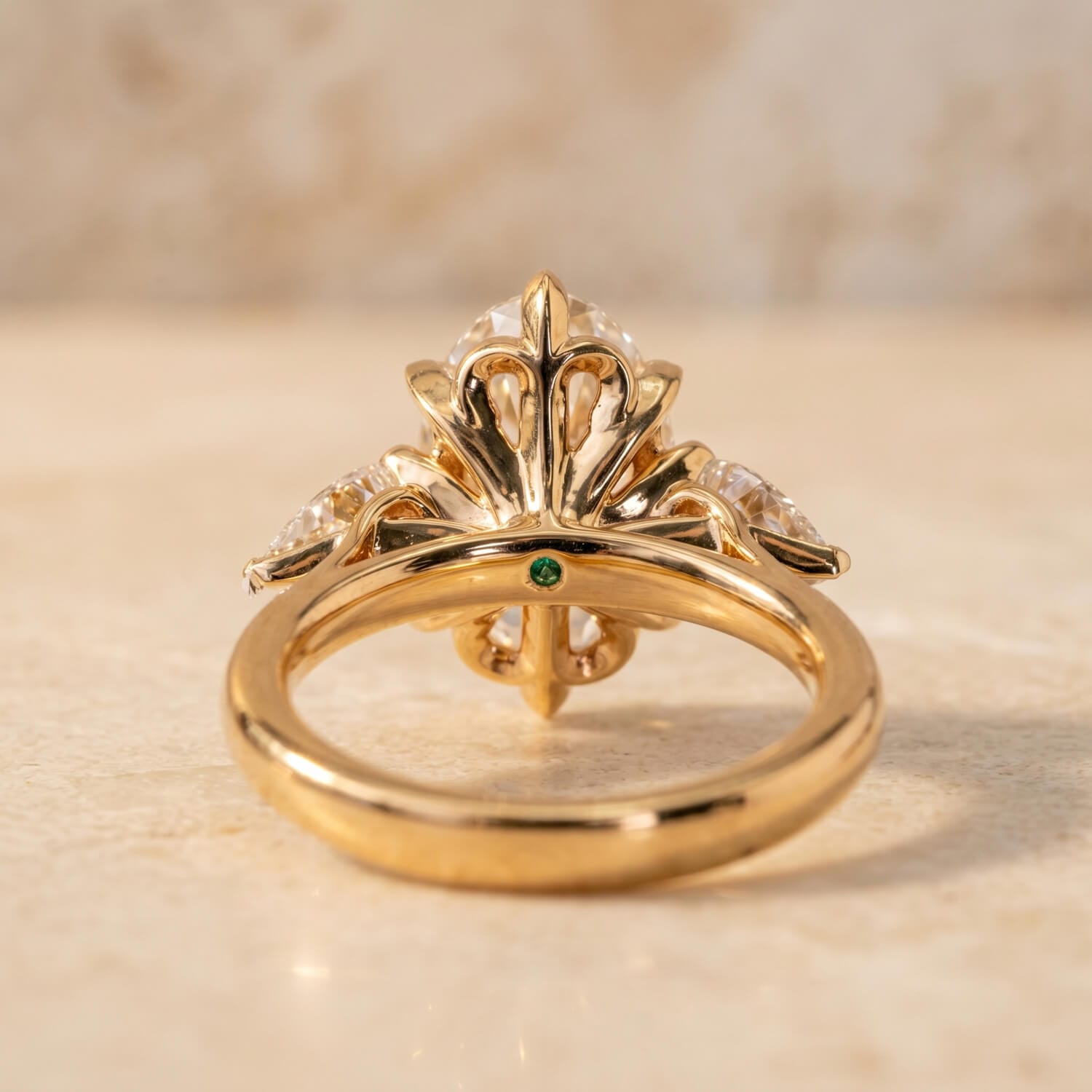 Hidden natural emerald beneath the center diamond