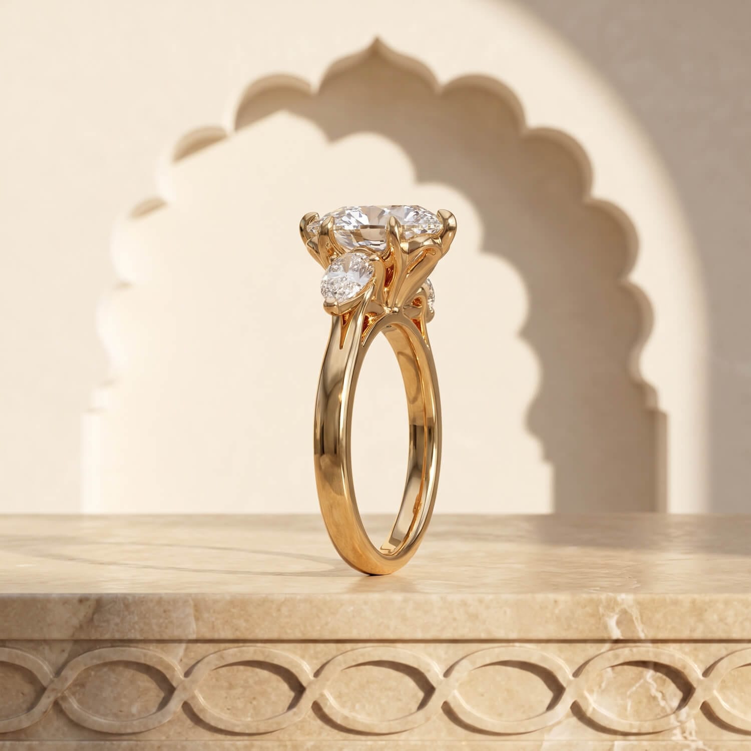 Three-stone diamond ring with a smooth polished yellow gold shank
