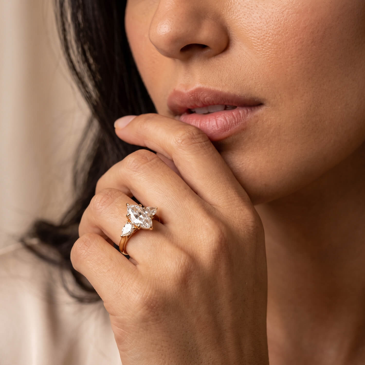 Custom floral gallery diamond engagement ring worn on hand