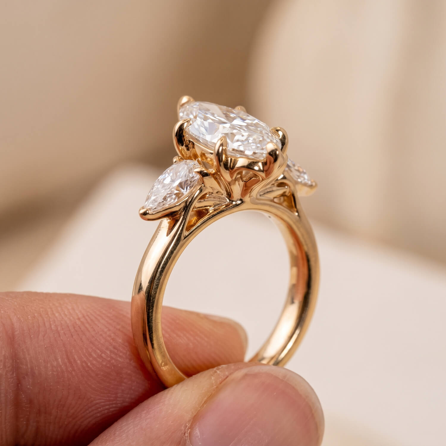Elongated oval lab-grown diamond three-stone engagement ring