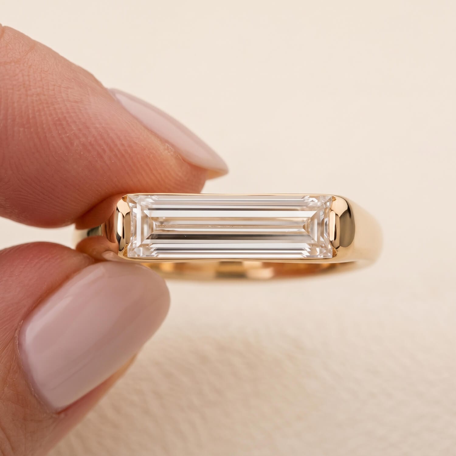 Custom minimalist engagement ring with horizontal baguette diamond