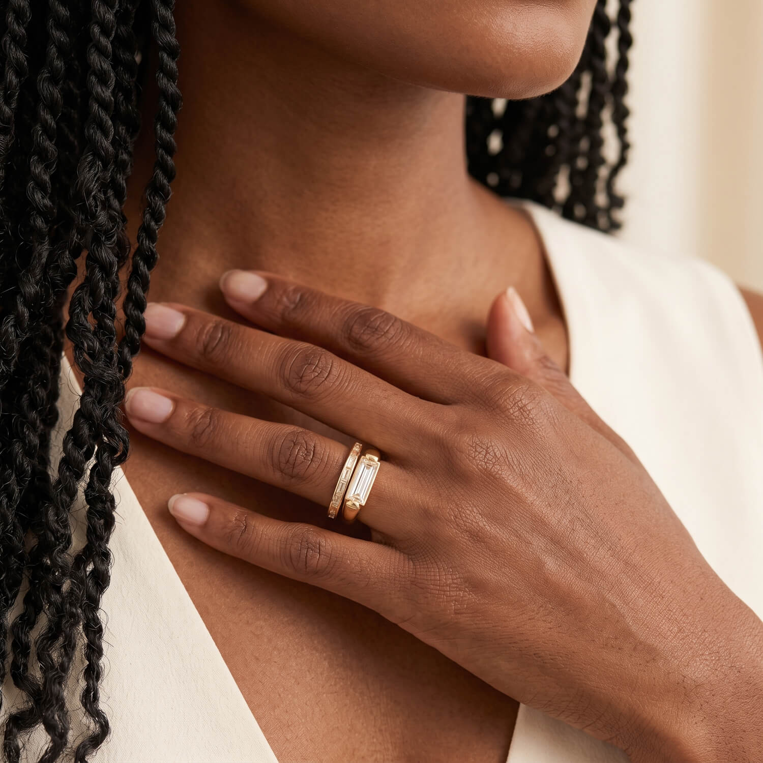 Baguette diamond spanning most of the wearer's finger