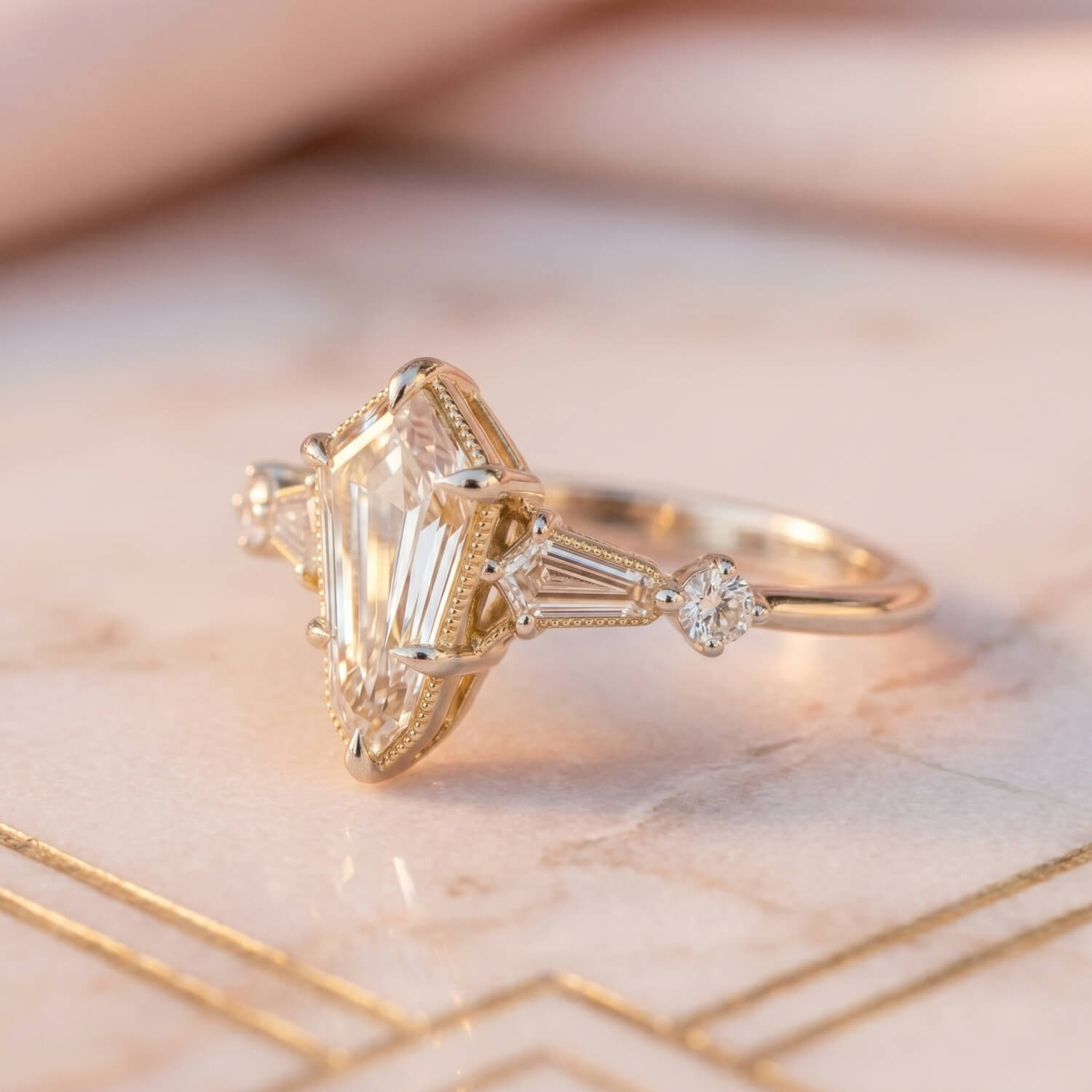 Bohemian kite diamond ring with warm yellow-gold details