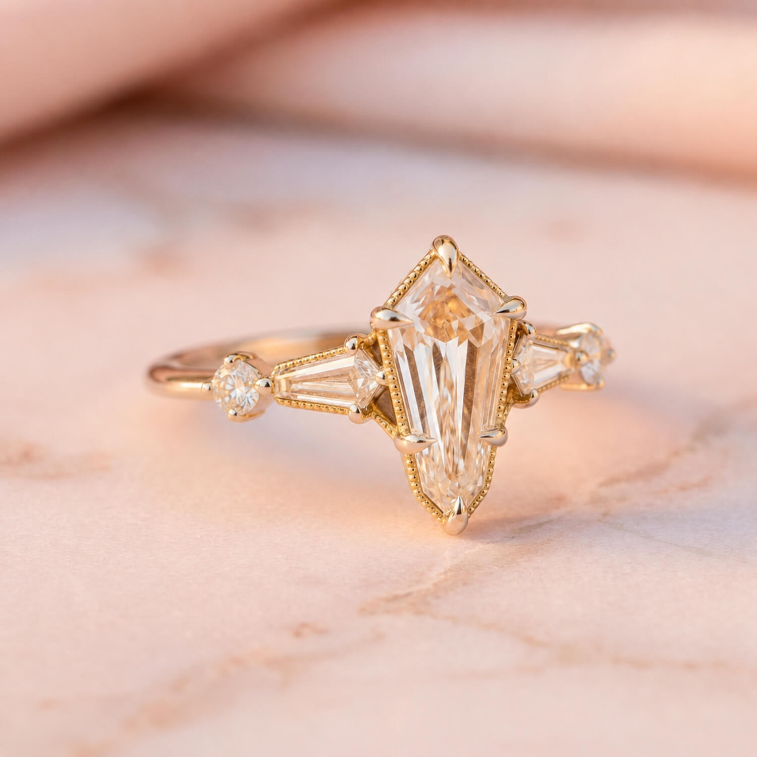 Branch-inspired mixed-metal engagement ring with a kite center diamond