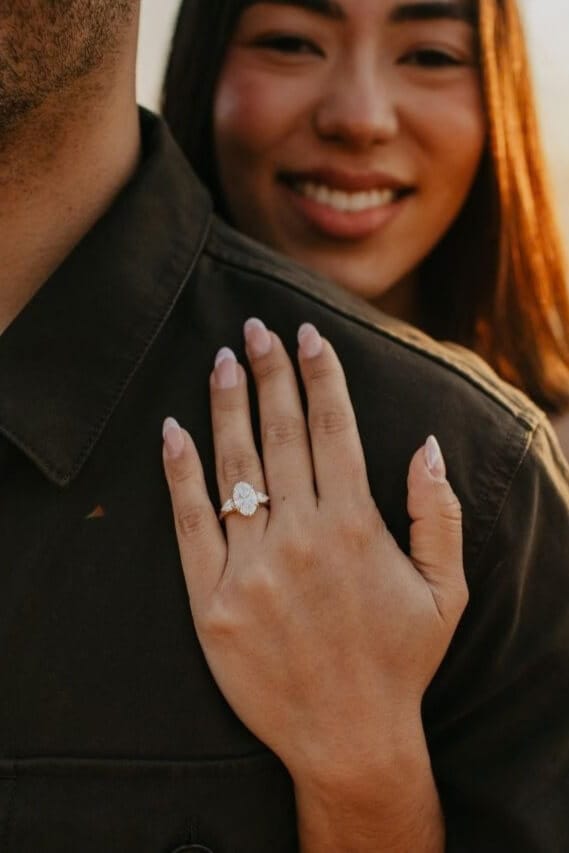 NinaVova custom engagement ring worn by a client